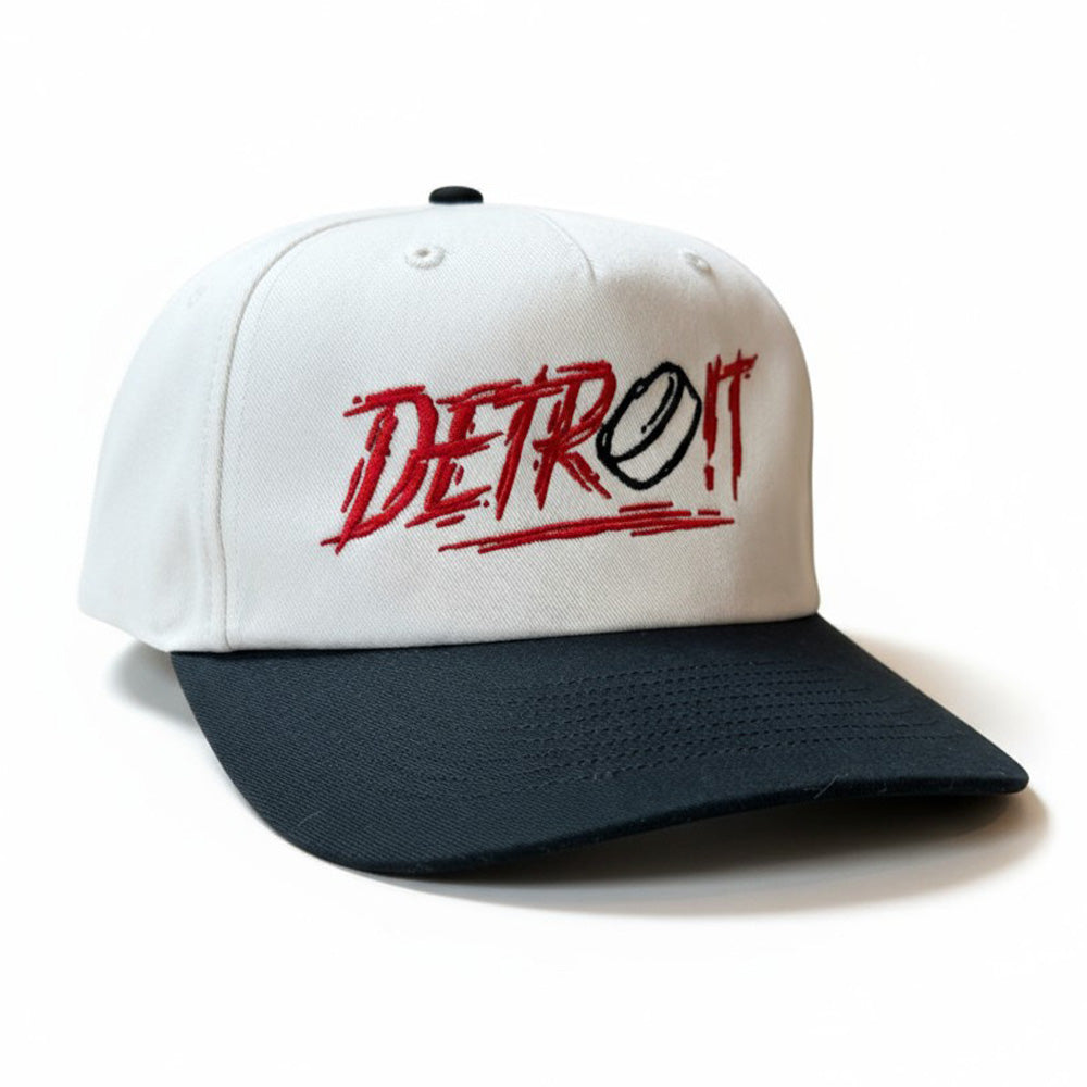 White cap with 'Detroit' logo on a white background